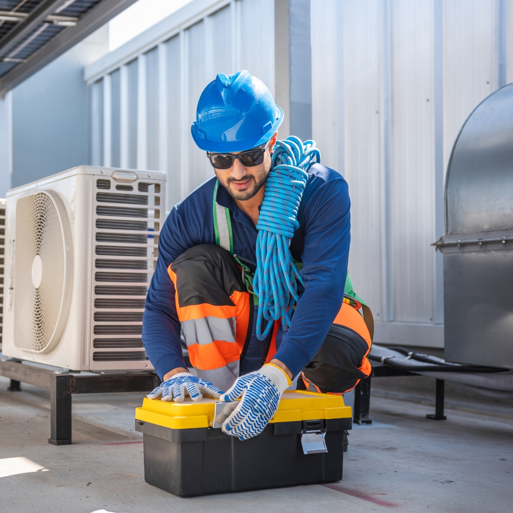 About Sayana professional AC technician opening toolbox to repair air condition in Riyadh Saudi Arabia